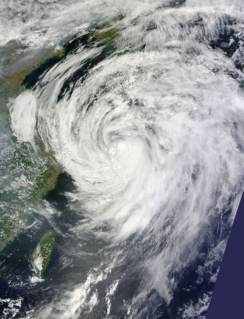 NASA's Terra satellite captured this visible image on July 9 at 02:30 UTC (July 8 at 10:30 p.m. EDT) as Typhoon Neoguri was approaching Kyushu, Japan.   The visible image revealed that Neoguri's eye had disappeared and the center has become somewhat elongated as the storm weakened into a tropical storm.  The Joint Typhoon Warning Center or JTWC noted that an upper level analysis revealed that Neoguri is now in a more harsh environment as northerly vertical wind shear increased to as much as 30 knots.    Credit: NASA/GSFC/Jeff Schmaltz/MODIS Land Rapid Response  Credit: NASA/GSFC/Jeff Schmaltz/MODIS Land Rapid Response   <b><a href="http://www.nasa.gov/audience/formedia/features/MP_Photo_Guidelines.html" rel="nofollow">NASA image use policy.</a></b>  <b><a href="http://www.nasa.gov/centers/goddard/home/index.html" rel="nofollow">NASA Goddard Space Flight Center</a></b> enables NASA’s mission through four scientific endeavors: Earth Science, Heliophysics, Solar System Exploration, and Astrophysics. Goddard plays a leading role in NASA’s accomplishments by contributing compelling scientific knowledge to advance the Agency’s mission.  <b>Follow us on <a href="http://twitter.com/NASAGoddardPix" rel="nofollow">Twitter</a></b>   <b>Like us on <a href="http://www.facebook.com/pages/Greenbelt-MD/NASA-Goddard/395013845897?ref=tsd" rel="nofollow">Facebook</a></b>   <b>Find us on <a href="http://instagram.com/nasagoddard?vm=grid" rel="nofollow">Instagram</a></b>