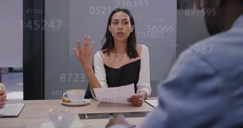 Diverse Business Team Collaborating on Data Processing