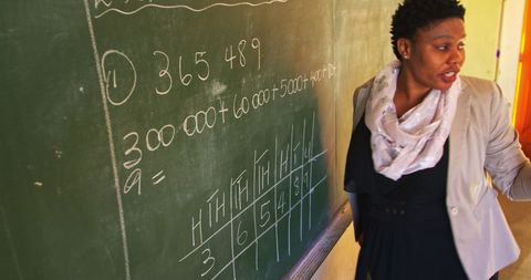 Engaging African American Teacher Explaining Math Concepts in Classroom - Download Free Stock Images Pikwizard.com