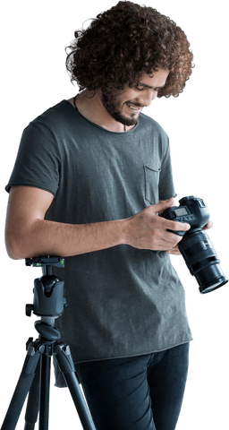 Smiling Photographer Reviewing Camera on Transparent Background - Download Free Stock Videos Pikwizard.com