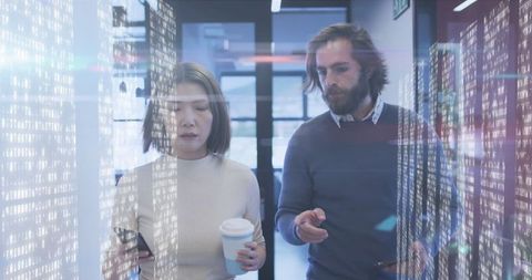 Professionals Analyzing Data with Holographic Interface