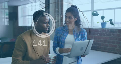 Diverse Colleagues Collaborating on Digital Data Insights