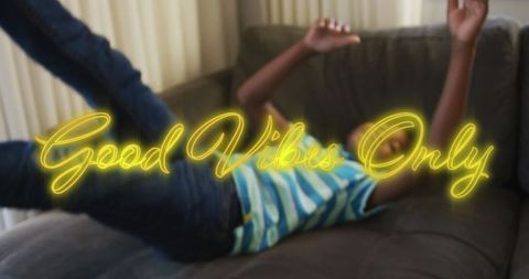 Good Vibes Only Quote with Relaxed Kid on Couch