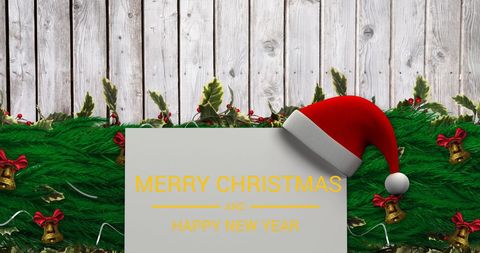 Festive Christmas Greeting Card with Santa Hat and Evergreen Decorations