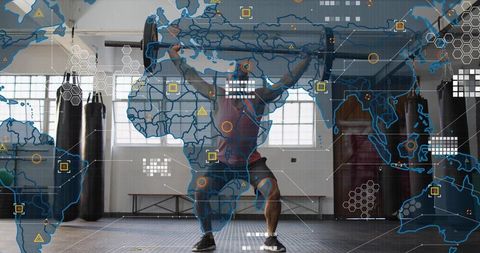 Athlete lifting overhead squat with loaded barbell in gym with futuristic data overlay