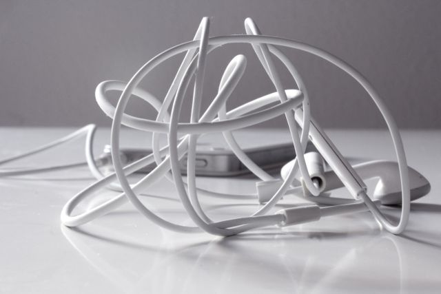 Perfect for illustrating themes of disorganization, technology, and everyday challenges. Great for blogs, articles, or presentations discussing connectivity issues, cable management, and modern tech problems.