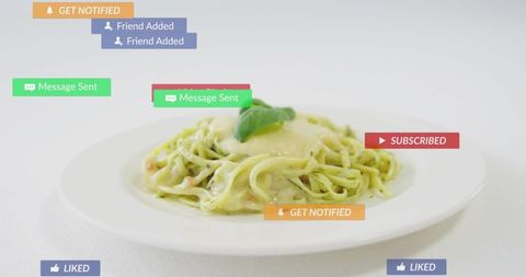 Pesto pasta with floating social media notifications concept for food influencer marketing