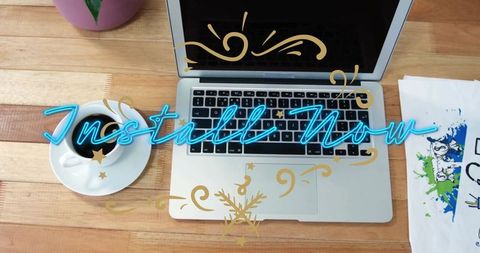 Stylish workspace with laptop and coffee cup