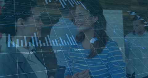 Businesswomen Discussing Technology with Data Overlay