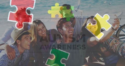 Friends Smiling at Beach with Autism Puzzle Overlay