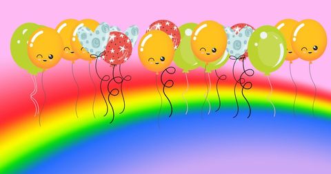 Colorful balloons floating over vibrant rainbow