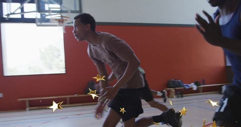 Determined Basketball Players Running Drill on Indoor Court