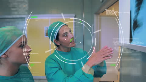 Doctors Reviewing X-ray with Futuristic Interface