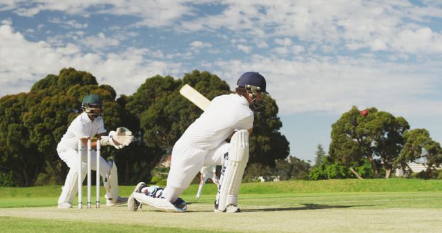 Batsman Hitting Cricket Ball on Sunny Day - Download Free Stock Images Pikwizard.com