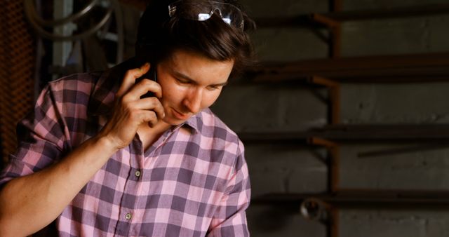 Woodworker in Workshop Talking on Phone - Download Free Stock Images Pikwizard.com