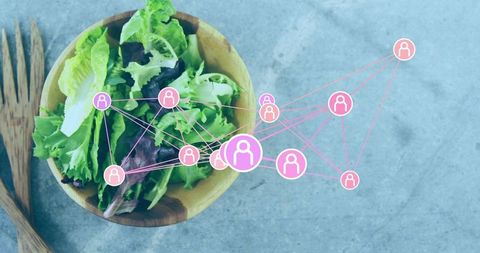 Wooden salad bowl with social network overlay connecting community and healthy eating
