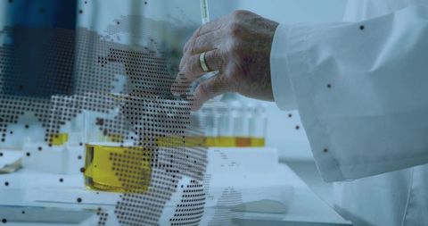 Pipetting amber sample on lab bench with world map overlay for global research concept and biotech