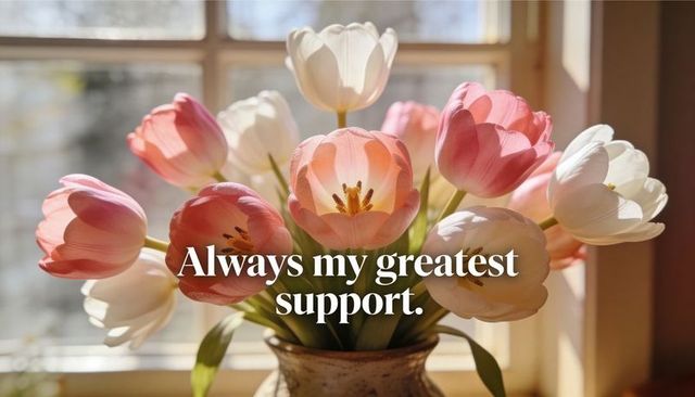 Pink and white tulips blooming on windowsill in ceramic vase bathed in warm light