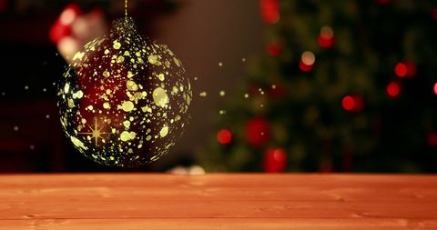 Gold Christmas Bauble with Festive Holiday Lights - Download Free Stock Images Pikwizard.com