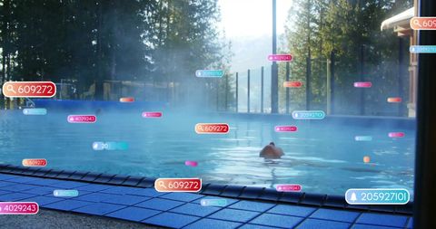 Person Surrounded by Data Tags Swimming in Pool