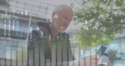 Senior Financier Analyzing Data on Mobile While Walking Outdoors