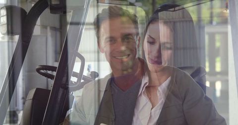 Teamwork in Modern Warehouse with Technology and Forklift