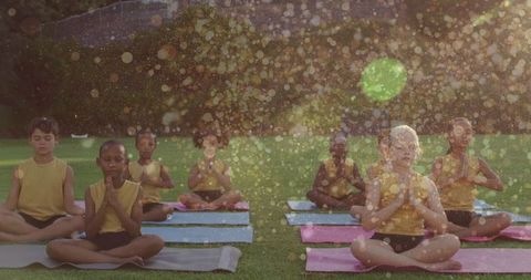 Diverse Kids Practicing Yoga Outdoors With Light Spots