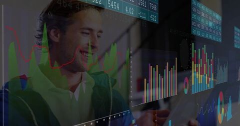 Young professional analyzing financial dashboards on tablet with colorful charts