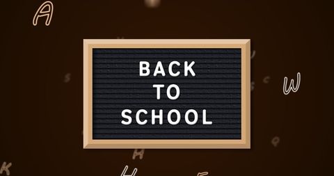 Back to School Text on Black Slate Encouraging Education