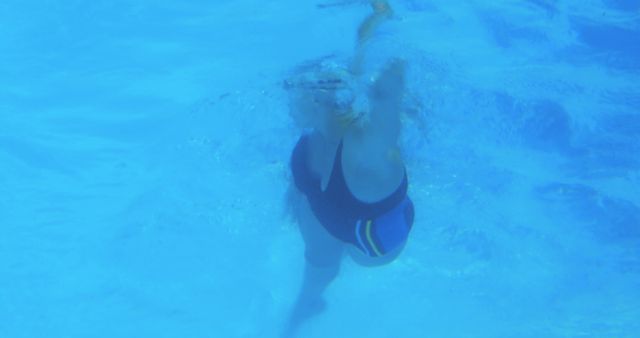 Underwater Shot of a Swimmer Performing Backstroke - Download Free Stock Images Pikwizard.com