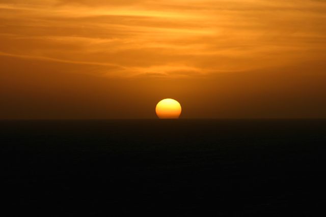 Golden Sunset Over Tranquil Ocean Horizon - Download Free Stock Photos Pikwizard.com