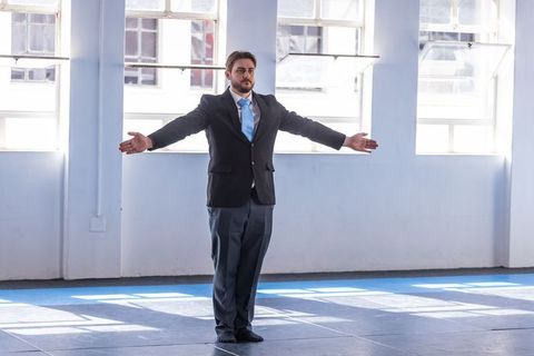 Businessman Engaging in Workout in Martial Arts Studio