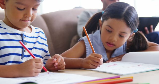 Young Siblings Studying at Home Together - Download Free Stock Images Pikwizard.com