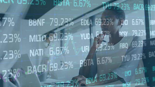 An African American woman is seen thoughtfully analyzing financial data on a laptop, with a digital overlay representing stock market prices and financial data. This representation is useful for depicting concepts of business technology, economic trends, and corporate environments. Ideal for illustrating articles on financial analysis, stock market insights, or business strategy sessions.