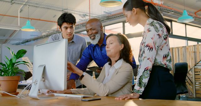 Diverse Team Collaborates in Contemporary Office Environment - Download Free Stock Images Pikwizard.com