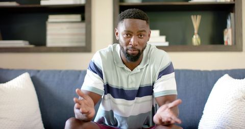 Relaxed Man Having Video Call at Home