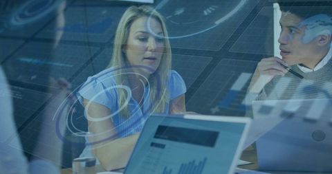 Business Team Analyzing Data with Virtual Augmented Interface