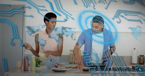 Couple preparing vegetables with augmented reality overlay in modern kitchen