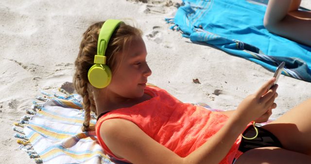 Young Girl Relaxing With Headphones on Sunny Beach - Download Free Stock Images Pikwizard.com