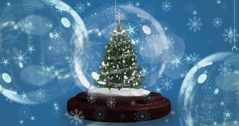 Festive Snow Globe with Christmas Tree and Snowflakes on Blue Background - Download Free Stock Images Pikwizard.com