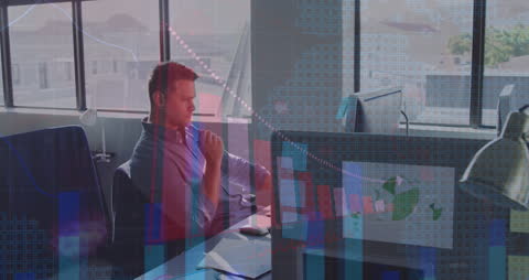 Financial Data Animation Overlay on Businessman Working in Office