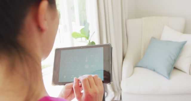 Woman Controlling Home Automation System with Digital Tablet - Download Free Stock Images Pikwizard.com