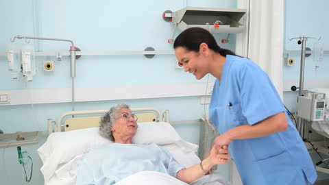 Healthcare Worker Showing Empathy with Elderly Patient