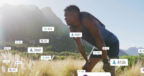 Focused athlete resting on mountain hiking path with fitness metrics overlay