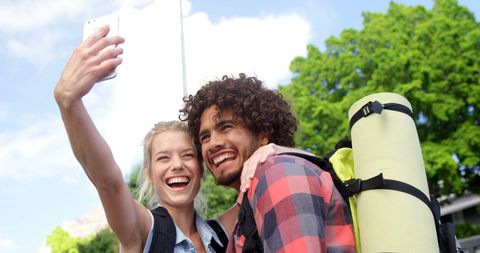 Happy Diverse Friends Taking Selfie Outdoors on Sunny Day