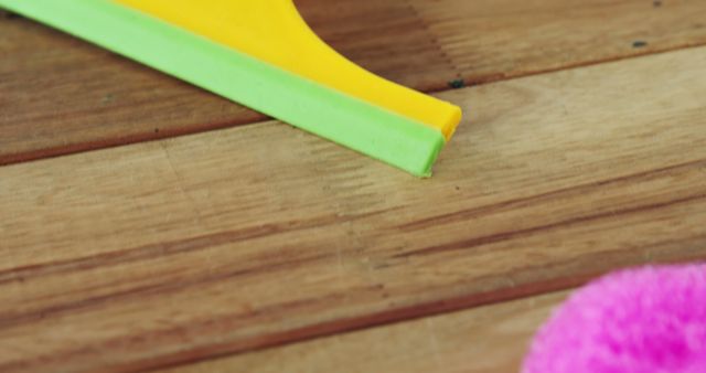 Close-Up of Mop and Squeegee on Wooden Floor - Download Free Stock Images Pikwizard.com