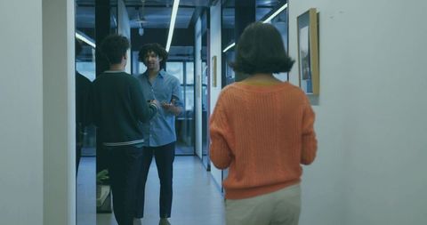 Colleagues Engaging in a Productive Office Discussion