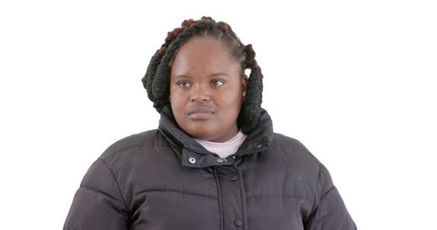 thoughtful african american woman in winter coat looking aside - Download Free Stock Images Pikwizard.com