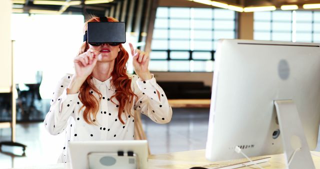 Woman Using Virtual Reality Goggles in Modern Office - Download Free Stock Images Pikwizard.com