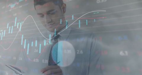 Businessman Analyzing Digital Data with Overlay Graphs - Download Free Stock Images Pikwizard.com